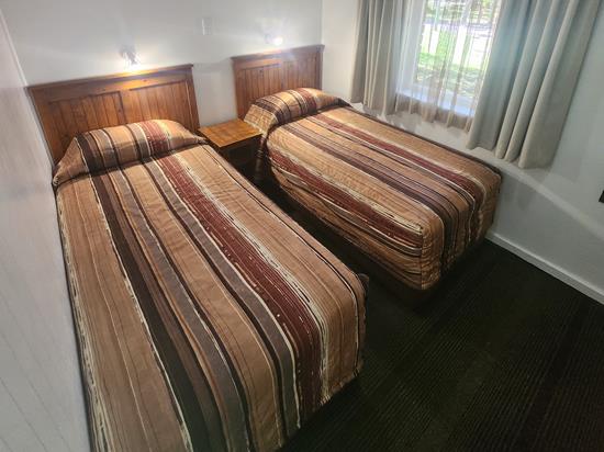 Plettenberg, A Forever Resort: 6-Sleeper Brick Chalet (Wheelchair accessible). No river view. 3 bedrooms (2 single beds & 2 bunk beds)