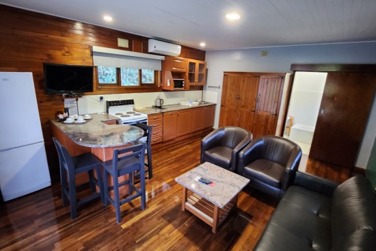 Plettenberg, A Forever Resort: 4-Sleeper Timber Chalet. No river view. 1 bedroom (1 double bed & Sleeper Couch for kids)